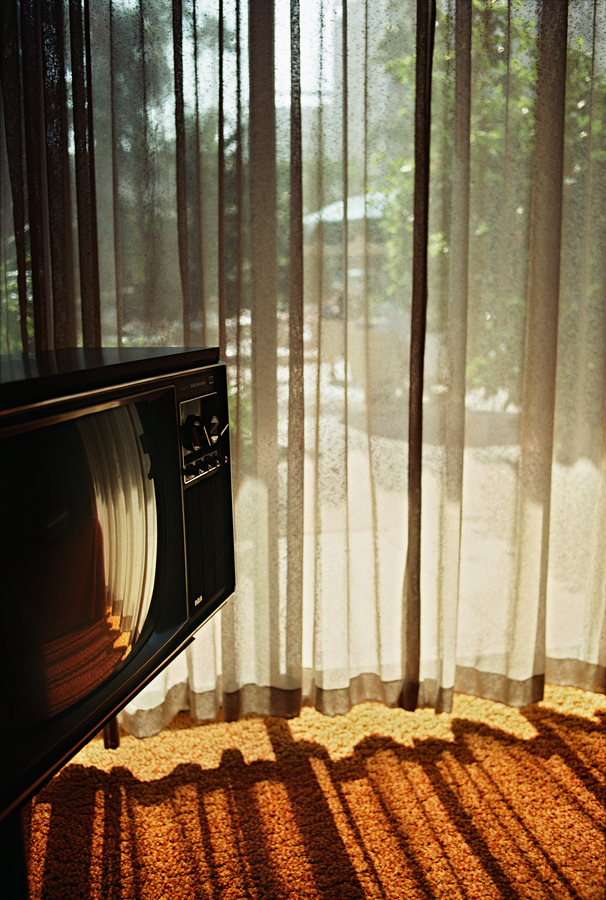 TV And Shadows / 2009 Getty Images, Ernst Haas A television set by a window, California, circa 1975. (Photo by Ernst Haas/Hulton Archive/Getty Images)